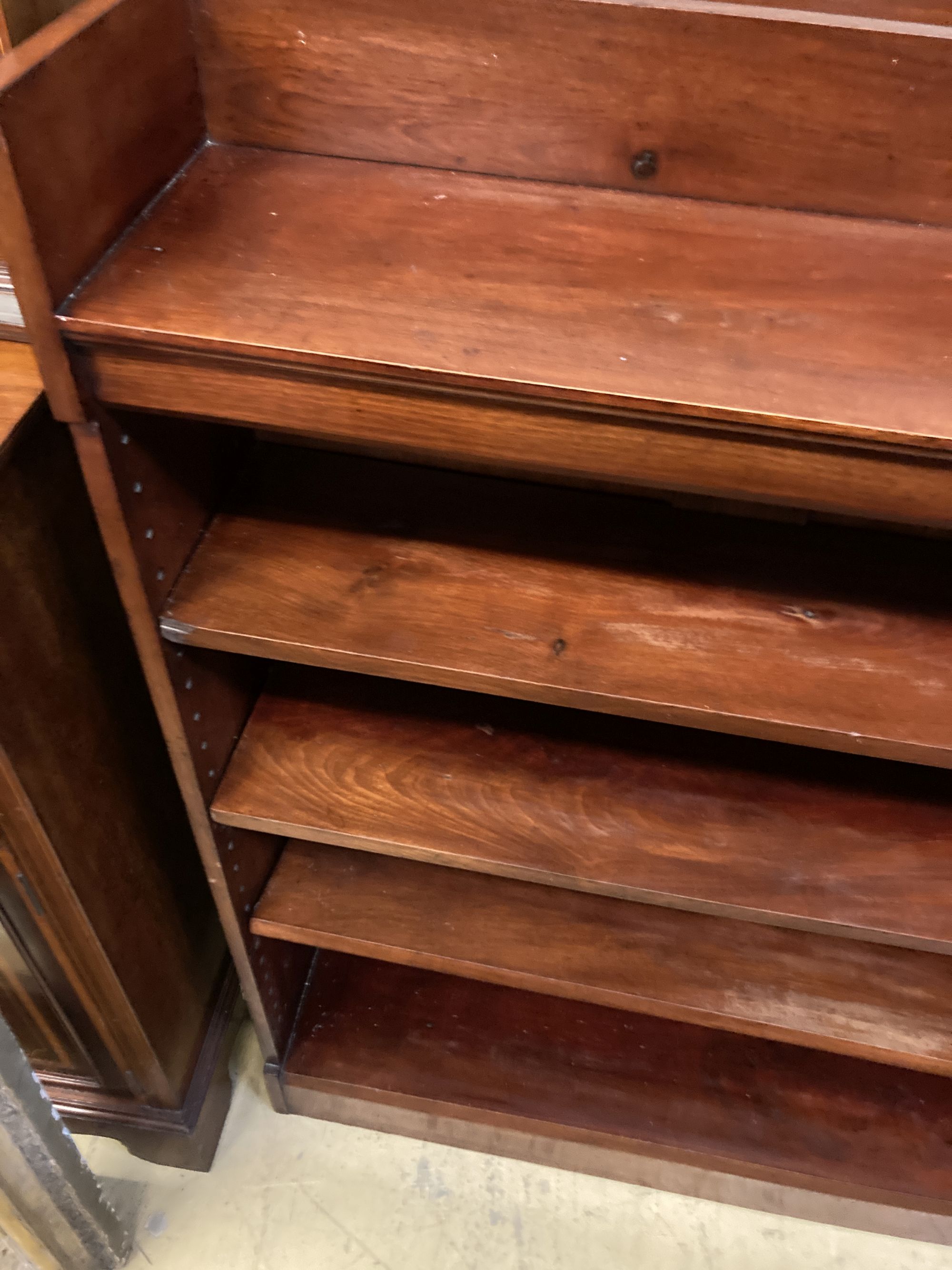 A pair of Victorian mahogany open bookcases, width 127cm, depth 24cm, height 126cm